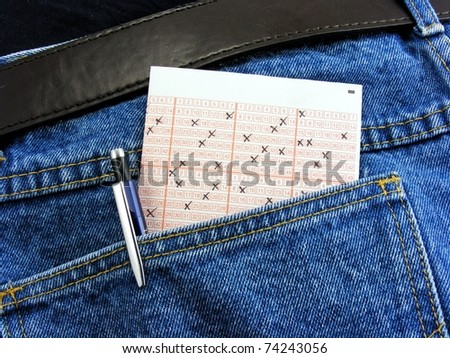 A lottery ticket in the back pocket of dark jeans