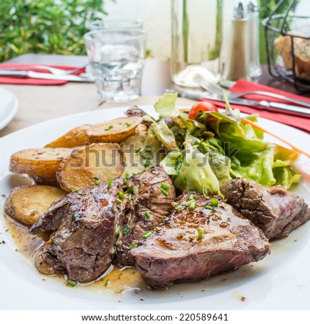 juicy steak beef meat with potatoes