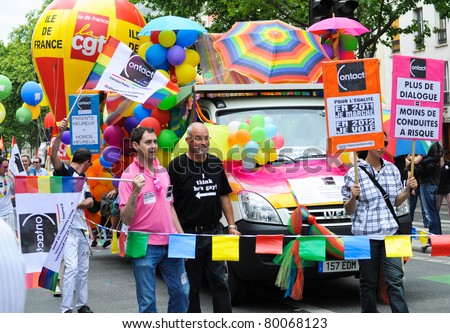 PARIS-JUNE 25:Unidentified people participate.400,000 people took part in the Gay Pride Parade to support gay rights,on June 25, 2011 in Paris, France.