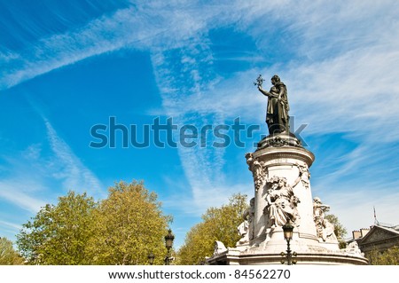 The Famous Statue of the Republic in Paris looking away in the blue sky. built in 1880 in the center of the place of the Republic. It symbolizes the victory of the Republic in France