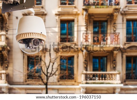 CCTV Camera or surveillance operating on window building