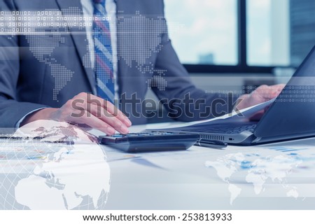 Close up of business man typing on laptop computer with technology layer effect, business globalization concept