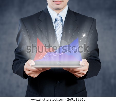 Businessman using tablet with digital visual object, business