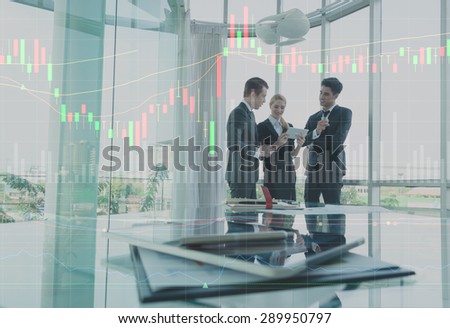 three business person discussing with graph layer effect