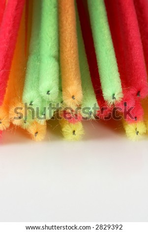 A bunch of brightly colored craft pipe cleaners