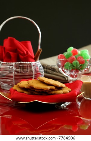 An elegant holiday dessert table with cookies and candy