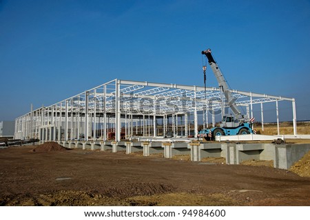 Photo of construction site of modern warehouse