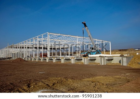 Photo of construction site of modern warehouse