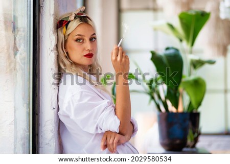 Similar – Image, Stock Photo Woman smoking in green forest