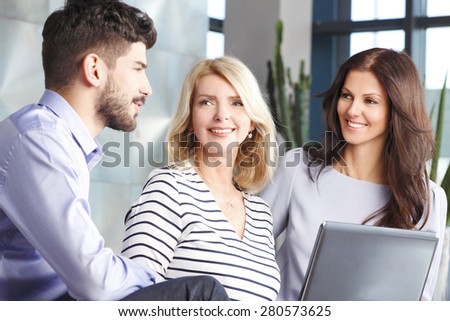 Image of business people sitting at job interview. Businesswomen and businessman discussing about future business plan.