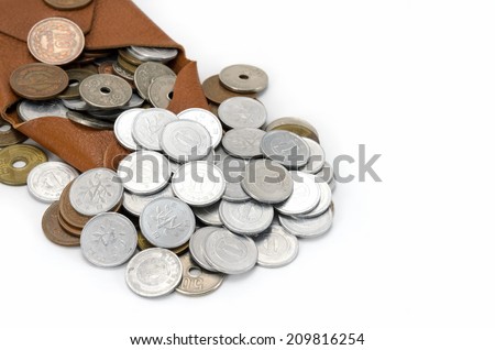 Coins and coin purse. on white background.