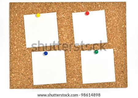 Cork board and blank notes. The blank notes of Four sheets stuck on the corkboard.