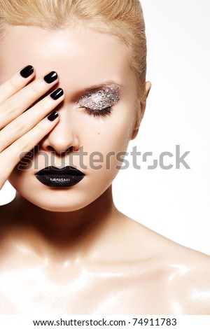 Fashion make-up. Shiny oil skin, black lips, nails