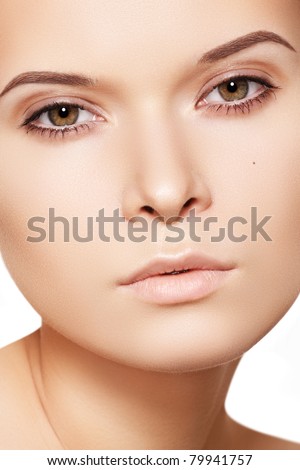 Natural beauty close-up portrait of beautiful young woman model face with clean skin. Wellness, skincare and naturally make-up