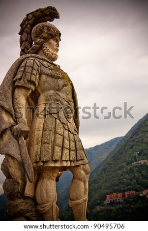 A warrior statue in Villa gardens, Como, Italy