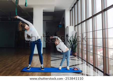 Charming family spends time in the gym