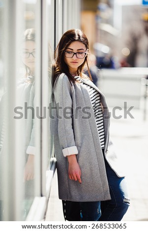 Beautiful fashion model with glasses shops