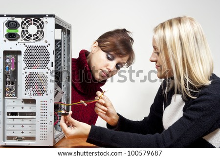 girls learn computer repair and