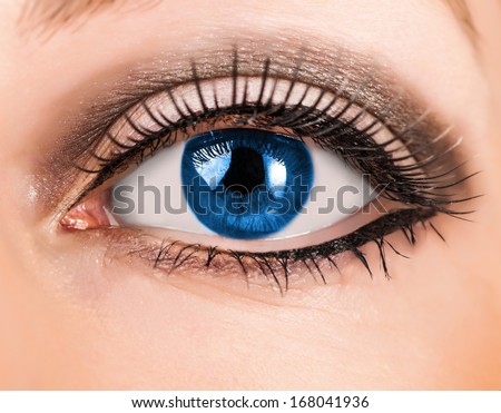 Beautiful woman blue eye with false  extremely long lashes