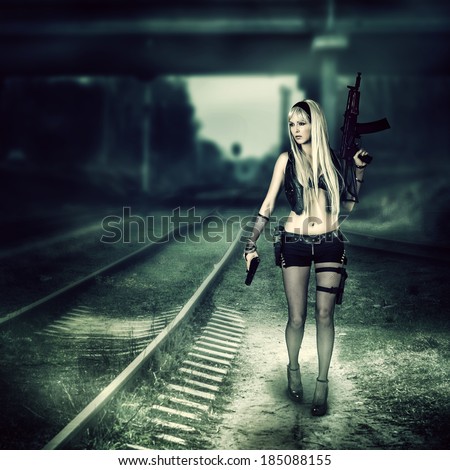 Sexy blond woman killer holding automatic and gun
