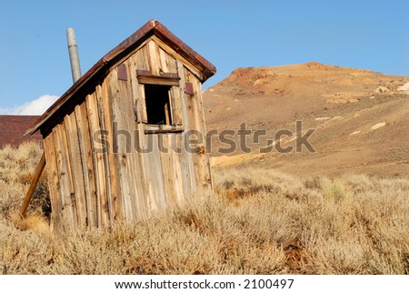 Old weathered deserted shack in California mining town