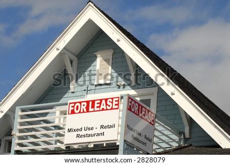 A for lease sign on the porch area of a house