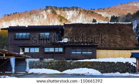 SHIRAKAWA GO, JAPAN - MARCH 27: Contemporary Japanese architecture built along side with the old style Gassho-zukuri farmhouse in UNESCO world heritage site on March 27, 2012 in Shirakawa Go, Japan.