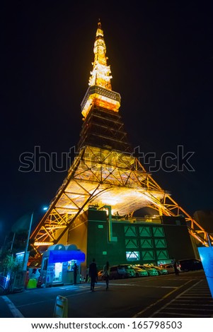 TOKYO, JAPAN - NOVEMBER 24: Tokyo Tower\'s under maintenance in Tokyo, Japan on November 24, 2013. Celebrating the 55th year in Japan, Tokyo Tower is in a process of repainting and a new face lifting