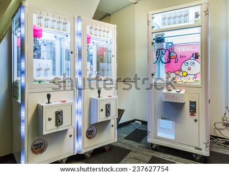 KYOTO, JAPAN - OCTOBER 21: Kyoto Tower in Kyoto, Japan on October 21, 2014.  The mascot\'s sold in coin operating machine by using joystick to control the clamp to pull the doll up
