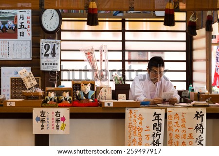 OSAKA, JAPAN - OCTOBER 24: Japanese Priest in Osaka, Japan on October 24, 2014. Unidentified \