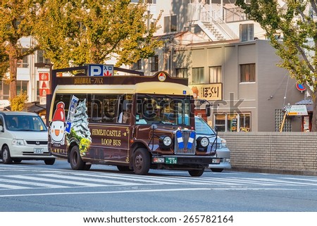 HIMEJI, JAPAN - OCTOBER 25: Loop Bus in Himeji, Japan on October 25, 2014. The Sightseeing Loop Bus is a cheap and convenient that makes a loop around the cultural area, only costs 100 Yen to ride