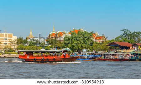 BANGKOK, THAILAND - JANUARY 1: Commuter Boat in Bangkok, Thailand on January 1, 2015. A great way to get around the famous Riverside area with its many historical attractions, temples and architecture