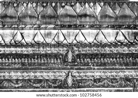 The White stucco design of native thai style on the Wall Ancient texture