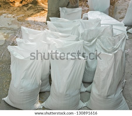 Sand bags help keep flood waters out of a town Process Flood protection