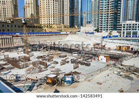DUBAI, UAE - NOVEMBER 16:  Dubai Marina. Construction of skyscrapers in Dubai, UAE,  November 16, 2012. Dubai was the fastest developing city in the world between 2002 and 2008.