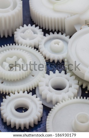 The plastic gear. Photo fragment of machine.
