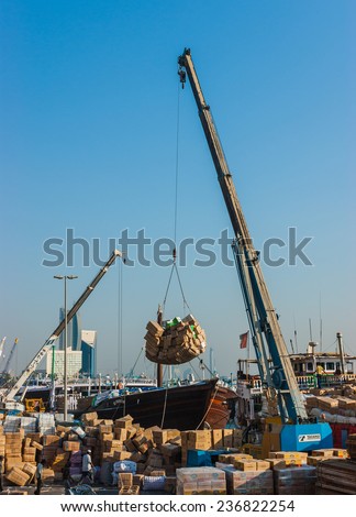 DUBAI, UAE-NOVEMBER 13: Loading a ship in Port Said on November 13, 2012 in Dubai, UAE. The oldest commercial port of Dubai