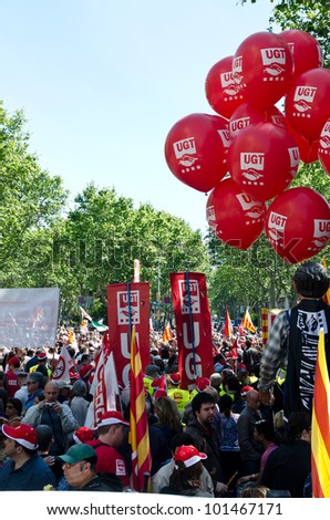 BARCELONA, SPAIN - MAY 01: Thousands of people celebrate International Workers\' Day with a May Day march against the recent cuts and for work, rights and dignity on May 1st, 2012 in Barcelona, Spain