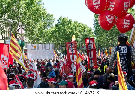 BARCELONA, SPAIN - MAY 01: Thousands of people celebrate International Workers\' Day with a May Day march against the recent cuts and for work, rights and dignity on May 1st, 2012 in Barcelona, Spain