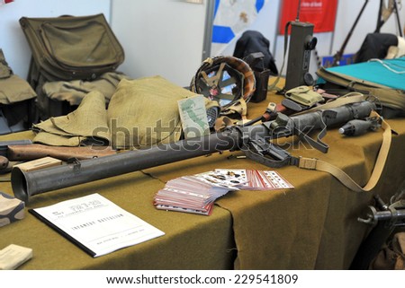 MILAN, ITALY - NOV 1: Bazooka,  Exhibitor sitting in his stand at Militalia, exhibition dedicated to militaria collectors and military associations on November 1, 2014 in Milan.