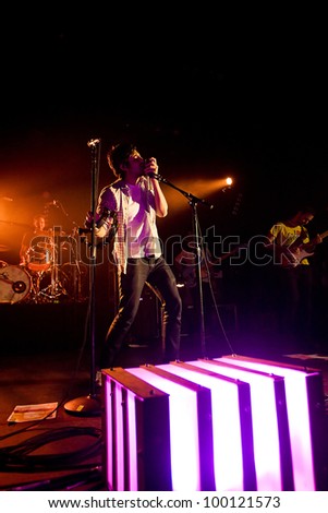 SEATTLE - April 7:  Sameer Gadhia of alternative Indie rock band Young the Giant performs with the group in front of a sold out audience at the Moore Theater in Seattle, Washington on April 7, 2012.