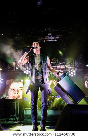 SEATTLE - SEPTEMBER 1, 2012:  Lead singer Perry Farrell of rock band Jane\'s Addiction performs on stage at Key Arena in Seattle during the music festival Bumbershoot on September 1, 2012.