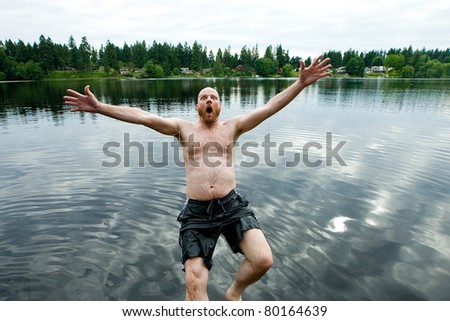 Man Falling Backwards into lake