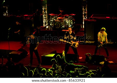 SEATTLE - JUNE 27:  Massachusetts punk rock band the Dropkick Murphys with lead singer Al Barr performS on stage at the Paramount Theater in Seattle, WA on June 27, 2011.