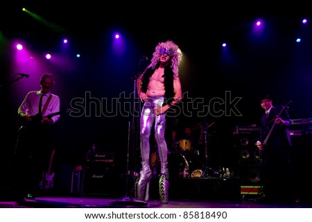 SEATTLE - JULY 1:  Lead singer Fee Waybill of rock band the Tubes performs on stage at the Triple Door Theater in Seattle on July 1, 2011.