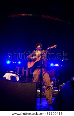 SEATTLE - DECEMBER 8, 2011:  John McCrea of alternative rock band Cake performs on stage during the Deck the Hall Ball in Seattle on December 8, 2011.