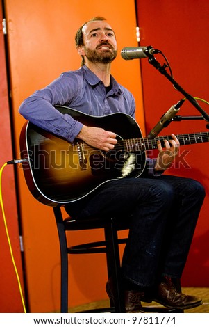 SEATTLE-FEB 10:  Singer and guitarist James Mercer of Indie Rock band the Shins performs a solo acoustic set at the Red Hook Brewery near Seattle, WA on February 10, 2012