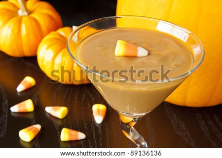 Butterscotch pudding with candy  corns and pumpkins