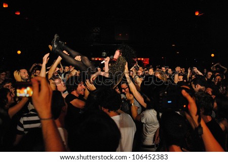 BARCELONA, SPAIN - JUNE 20: St. Vincent (band) crowd surfing at Apolo on June 20, 2012 in Barcelona, Spain.