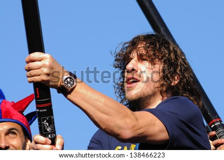 BARCELONA - MAY 13: Carles Puyol Saforcada, player and captain of F.C Barcelona football team, celebrates the title consecution of Spanish League on May 13, 2013 in Barcelona, Spain.